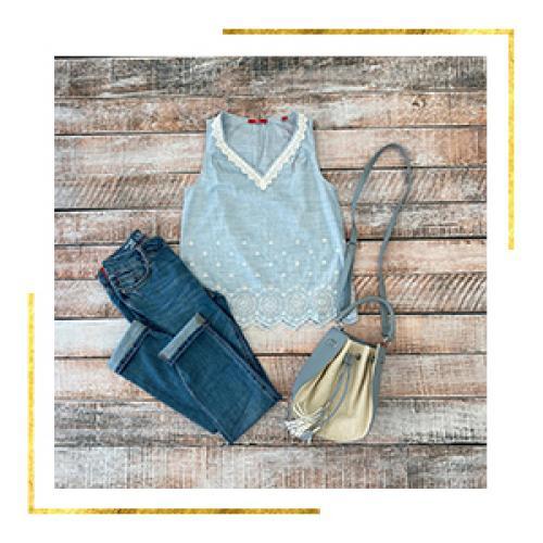 Frauenoutfit von Bluse, Jeans, Handtasche Frauenoutfit von Bluse, Jeans, Handtasche